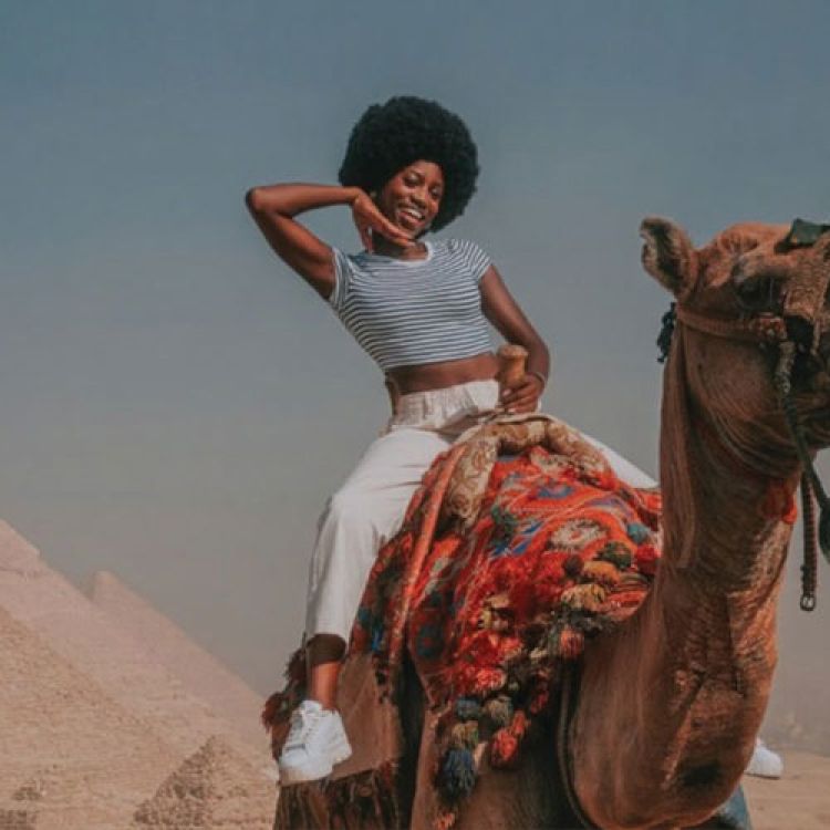 Tourist ride camel in Egypt